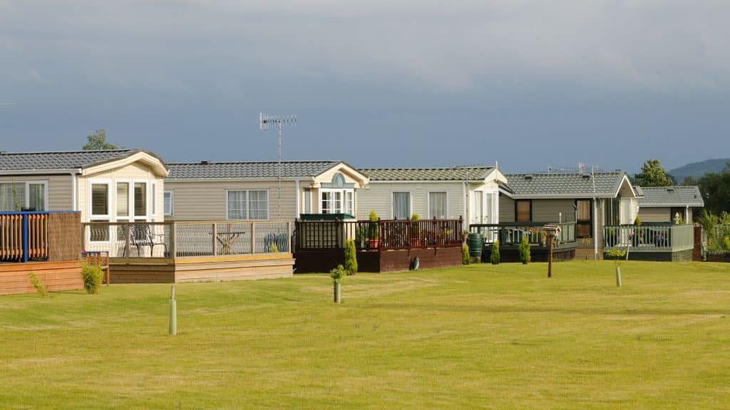 Generic mobile homes in a row with decks.
