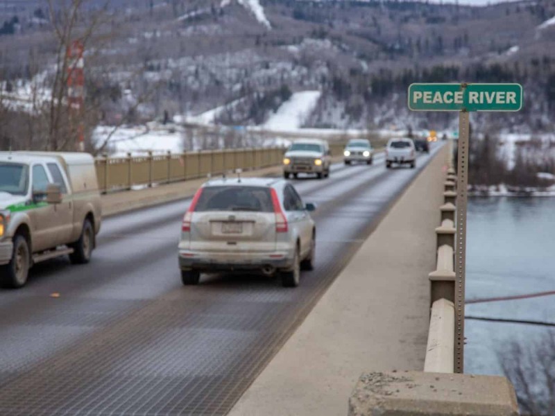 A concrete and metal grate bridge.