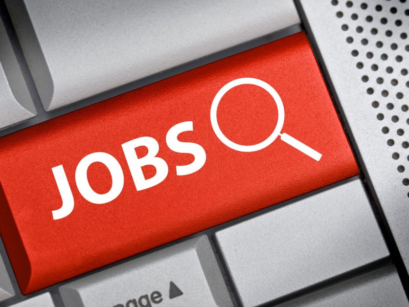 A red key on a keyboard that says "Jobs" next to a magnifying glass.