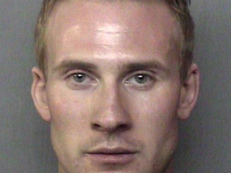 A headshot of John Wendell Keyler.