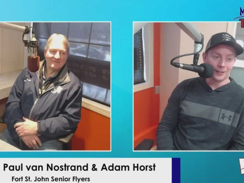 Person on left in black jacket, person on right with hat