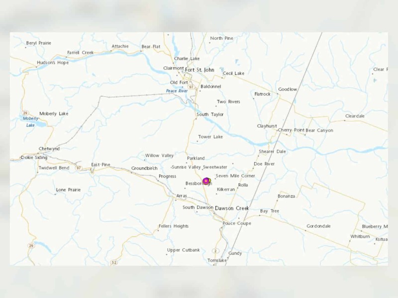 A green coloured map with pink and yellow dots indicating the location of seismic events.