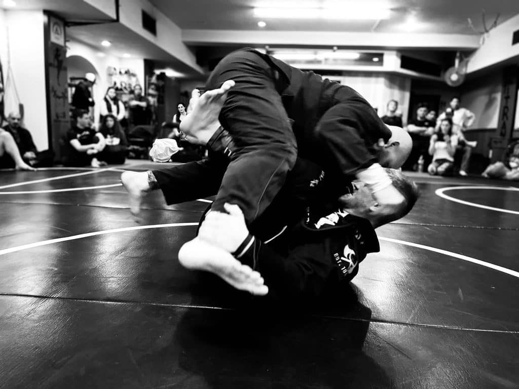 Perry Mcfie of the NCC grappling with another jiu jitsu practioner.