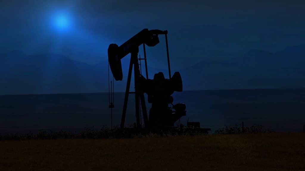 An oil pump at night.