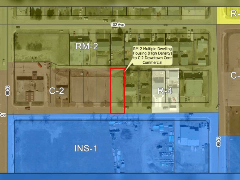 A block city map detailing different sectors by number, letter, and colour.