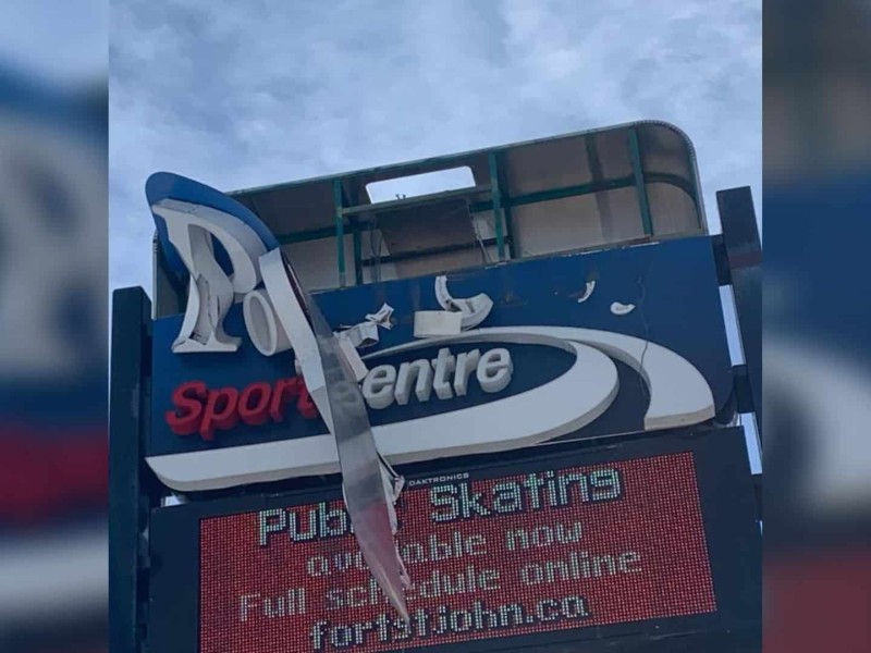 A sign that should read Pomeroy Sport Centre with the "Pomeroy" part ripped off due to wind damage.