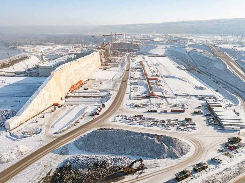 A wide shot of the Site C project covered in snow.