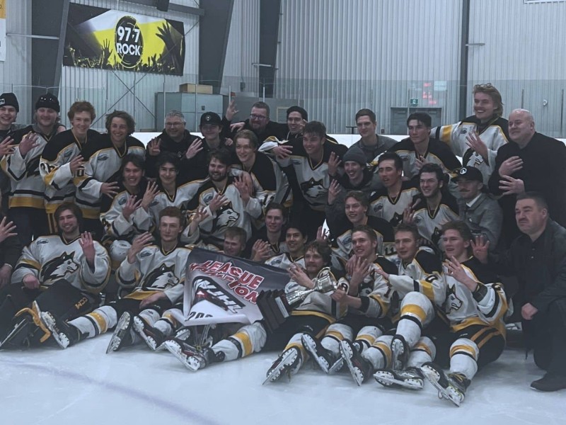 The Huskies Hockey team after the NWJHL championship, including coaches.