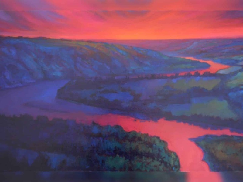 A painting of the Peace River at Sunset, winding through the valley.
