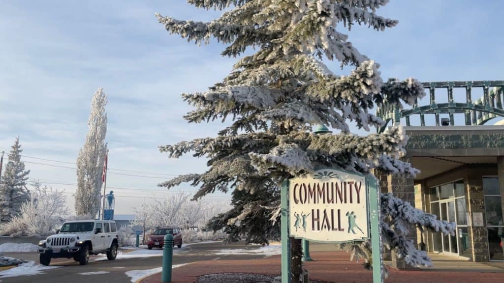 A picture of the Taylor Community Hall front entrance and sign.
