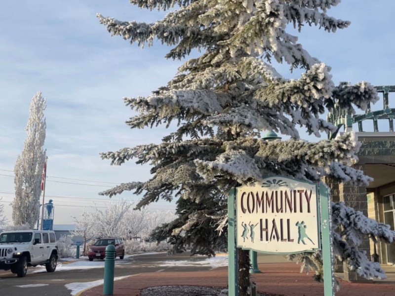 A picture of the Taylor Community Hall front entrance and sign.