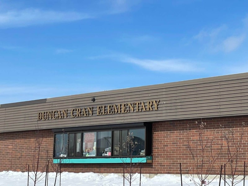 Duncan Cran Elementary school, a brick building with a brown roof.