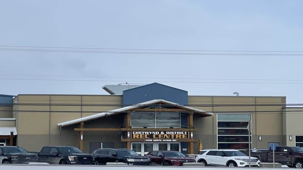 A photo of Chetwynd's rec centre with vehicles in front.