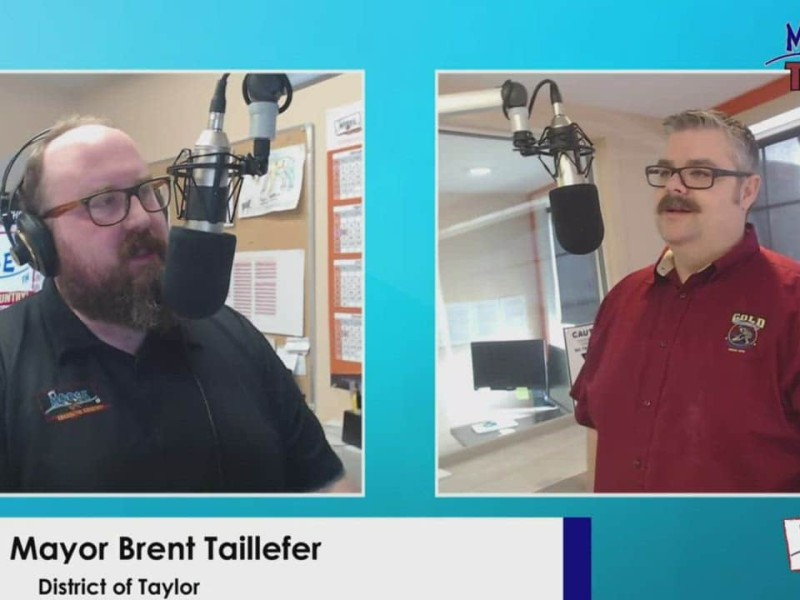 Person on left in black shirt, person on right in red shirt