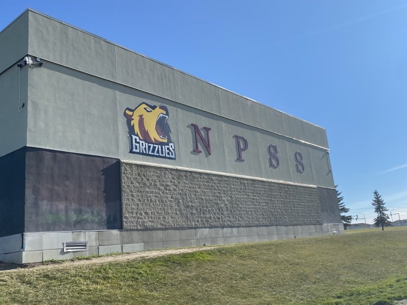 A grey building with "Grizzlies" and "NPSS" on the front.