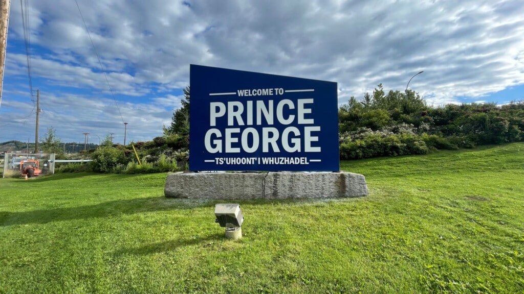 A blue sign that reads Prince George