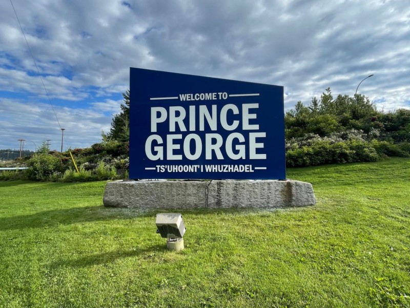 A blue sign that reads Prince George