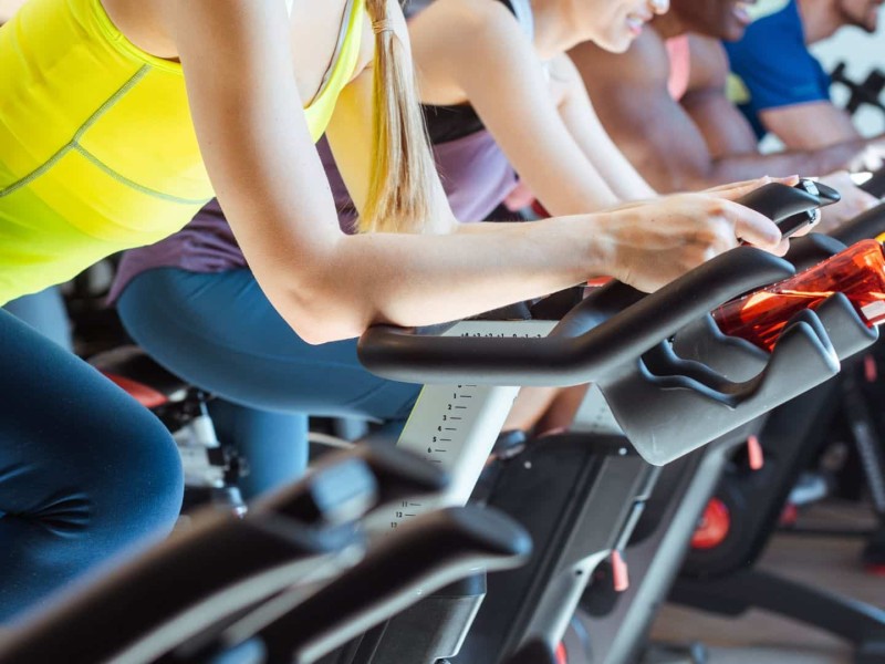 A group of people on spin bikes.