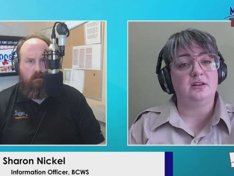 Two people staring at the camera