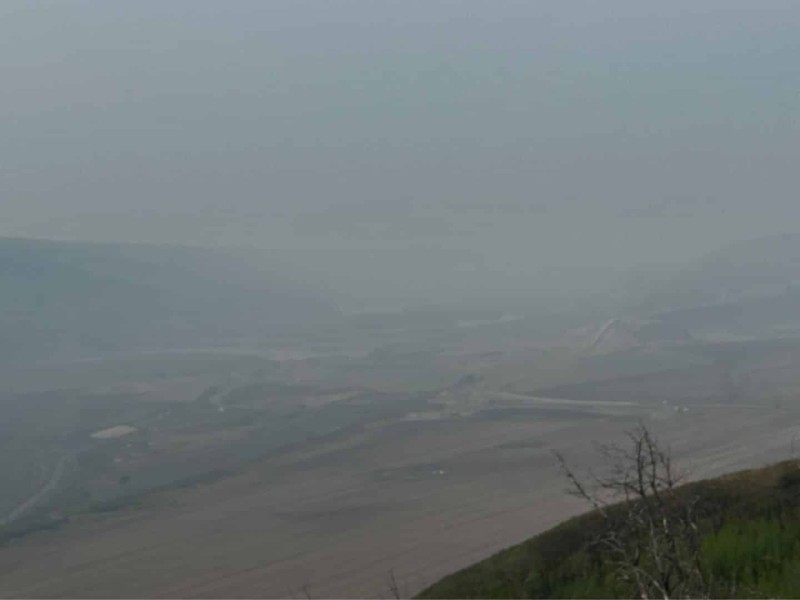 A smoke covered valley.