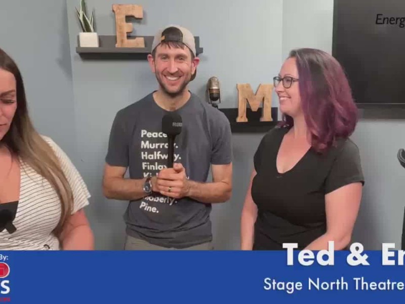 Three people smiling at the camera