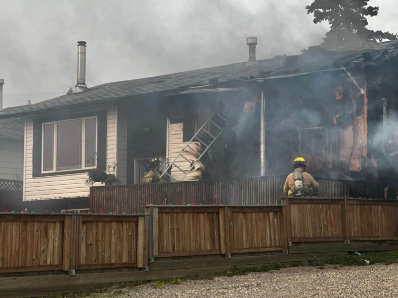Firefighters responding to a house fire.