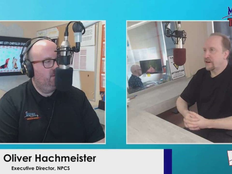 Two people talking in a studio