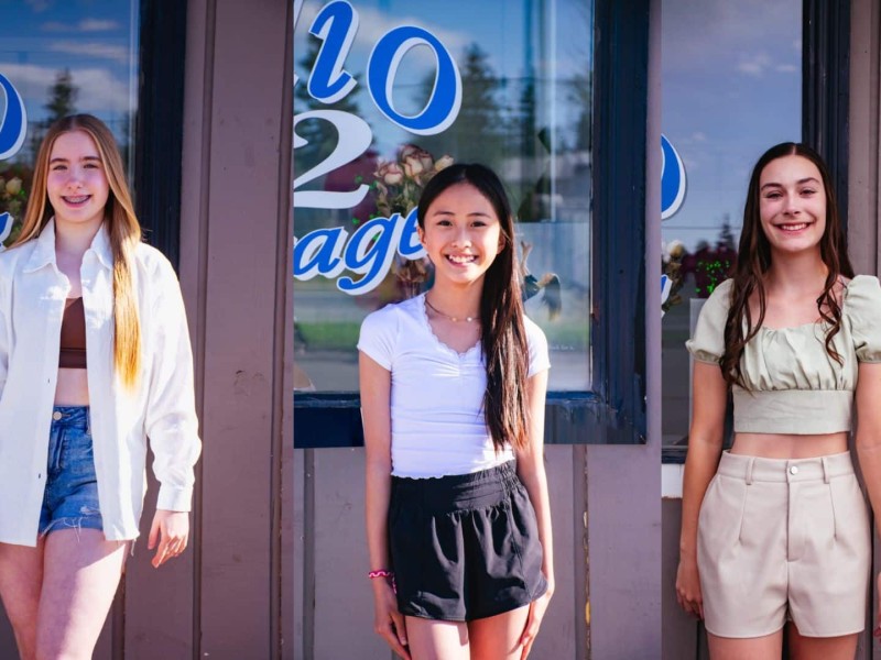 Three photo collage of three girls standing in front of Studio 2 Stage.
