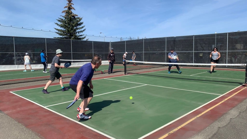People playing pickleball.