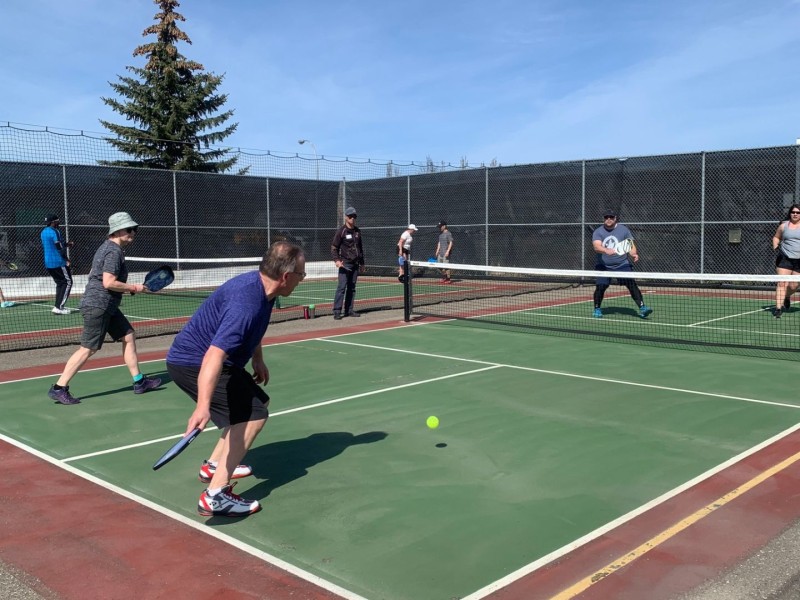 People playing pickleball.