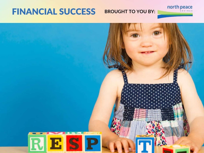 A child playing with blocks that spell out RESP