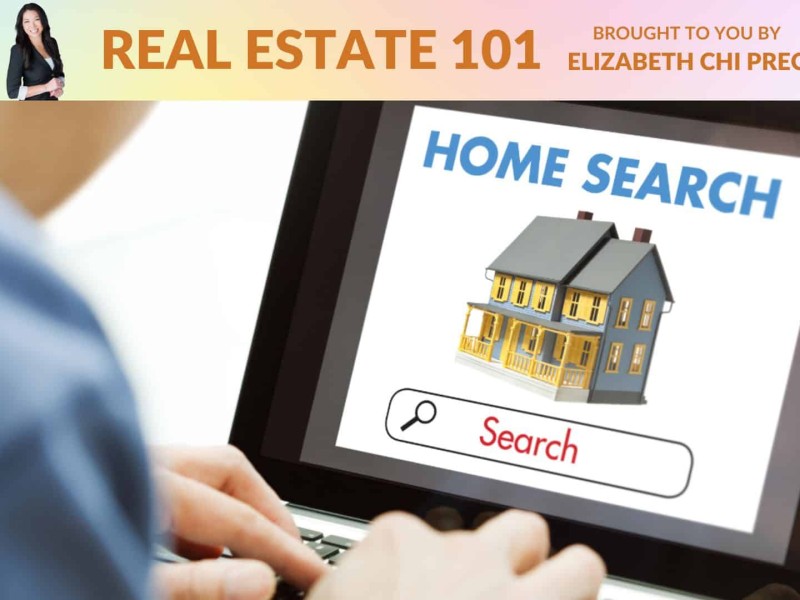 A person on a laptop searching for homes