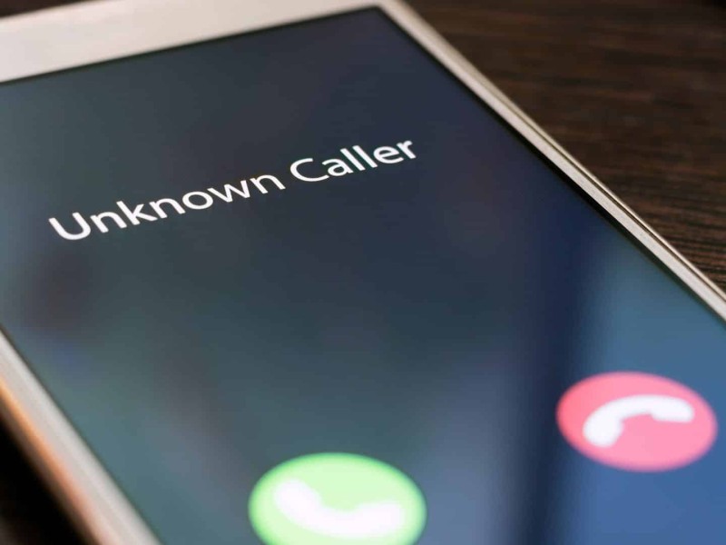 An iPhone receiving a phone call from an unknown number.