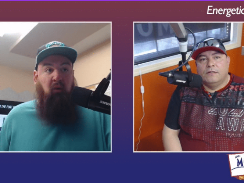 Two people recording a podcast