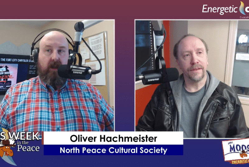Two people recording a podcast