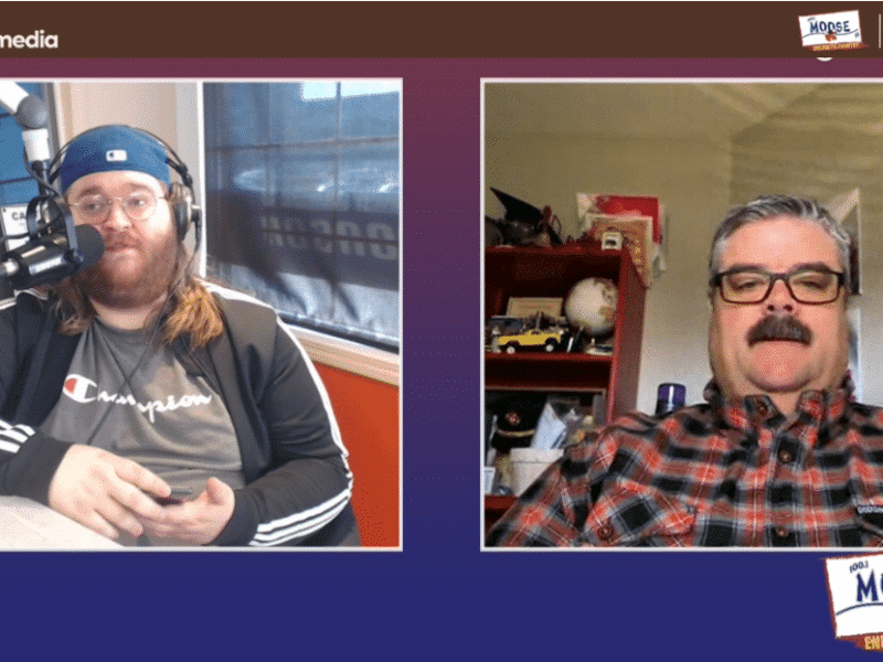 Two people recording a podcast