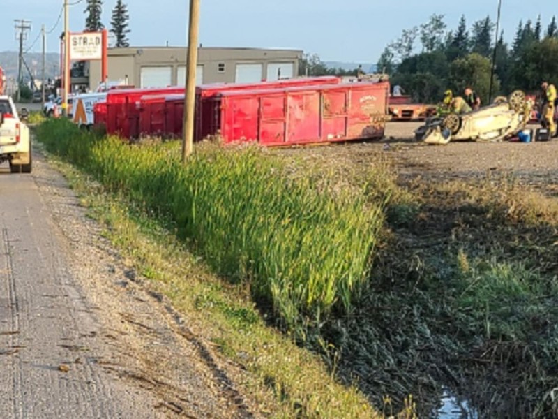 BC Ambulance, the Fort St. John RCMP and Fort St. John Fire Fire Department work to extricate driver from a vehicle.