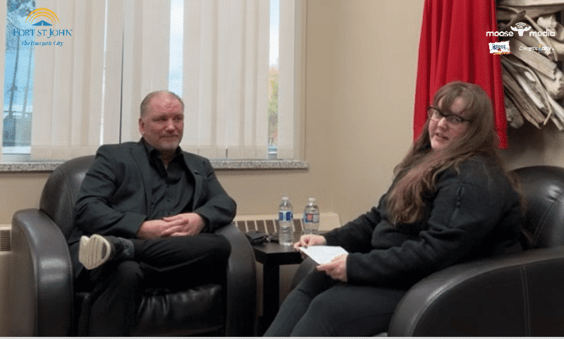 Two people recording an interview