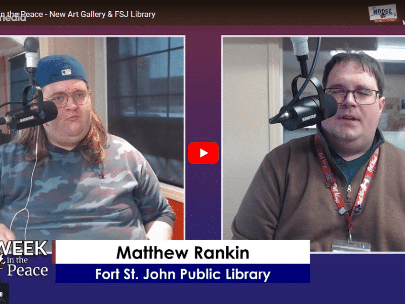 Two people recording a podcast