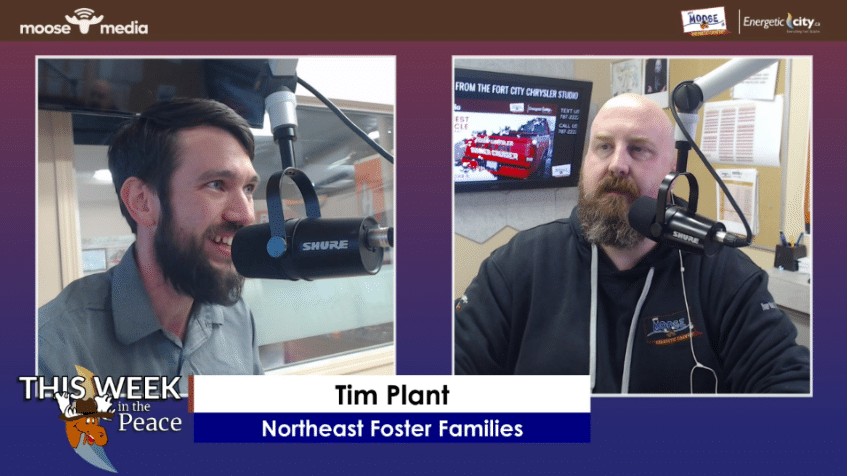 Two people recording a podcast