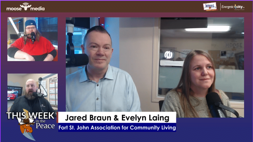 Four people recording a podcast