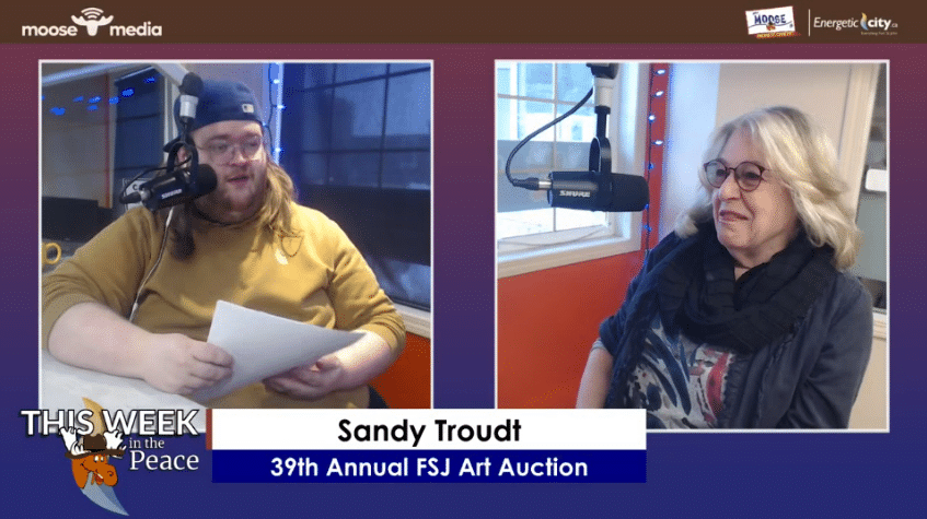 Two people recording a podcast