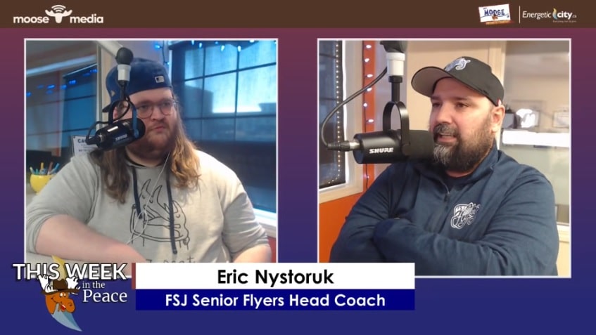 Two people recording a podcast