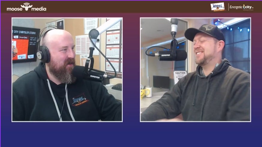 Two people recording a podcast