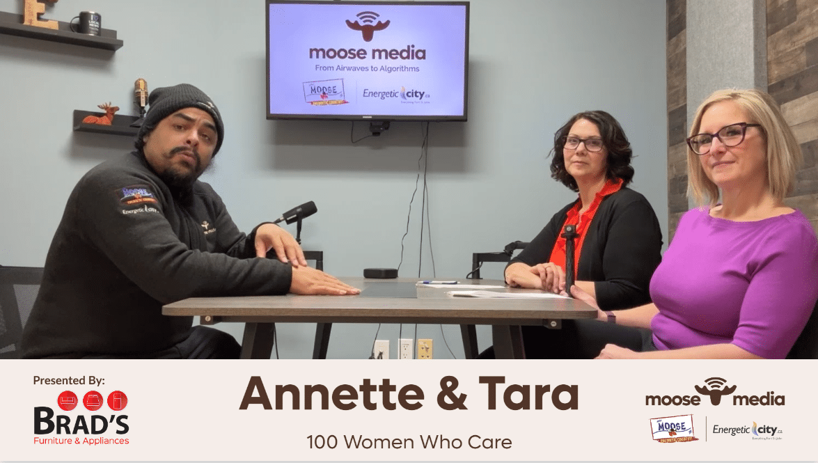 Three people smiling at the camera