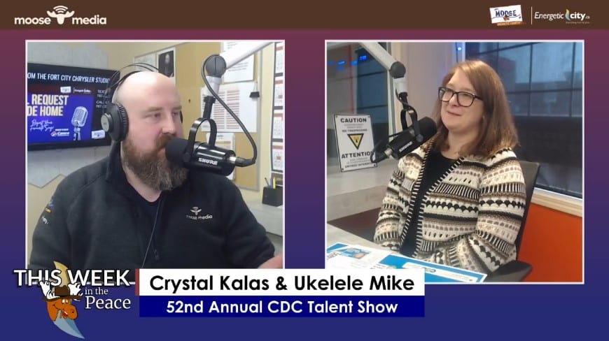 Two people recording a podcast