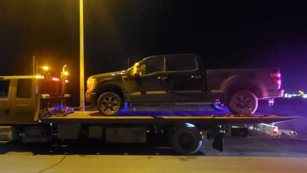 A truck on the back of a tow truck. BC Highway Patrol says it was being towed because it was driven by a class seven learner who was more than 60 km/h over the limit. (BC Highway Patrol)