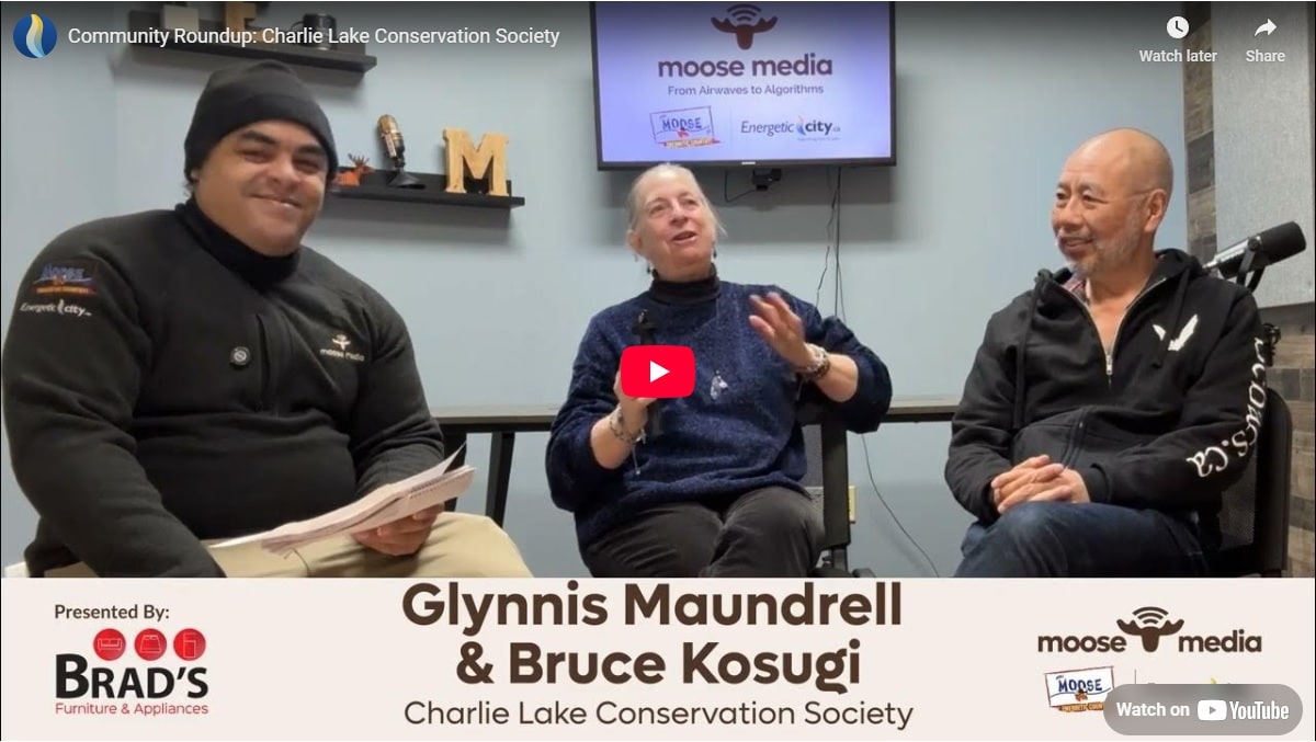 Three people smiling at the camera