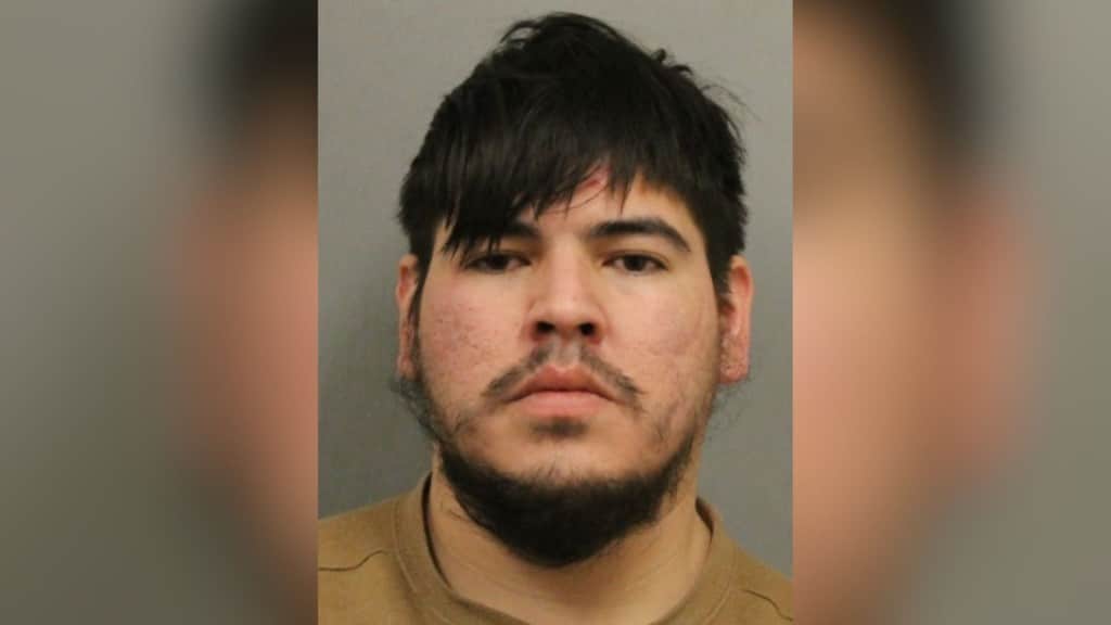 A mugshot of 29-year-old wanted man named Devin Calliou.