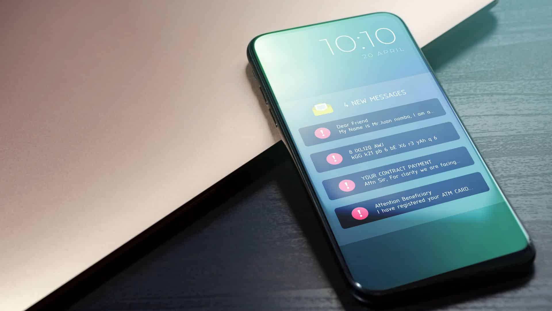 A cell phone with a series of scam text message notifications on the screen.